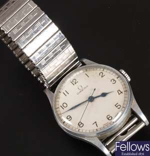 OMEGA - a base metal cased wrist watch with a