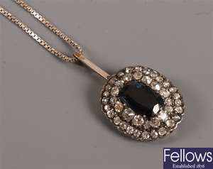 Sapphire and diamond cluster pendant, a central