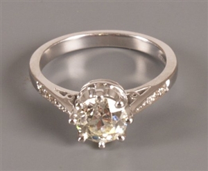 Claw set single stone old cut diamond ring of