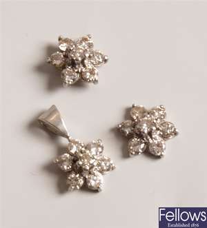 Pair 9ct white gold seven stone diamond cluster