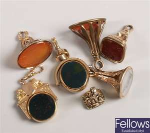A small collection of fobs, to include a 9ct gold