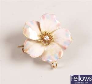 Diamond set flower design brooch with with white,