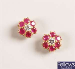 Pair of ruby and diamond set cluster earrings, a