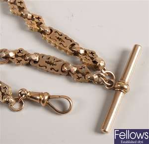 9ct gold fancy link half albert chain with t-bar.