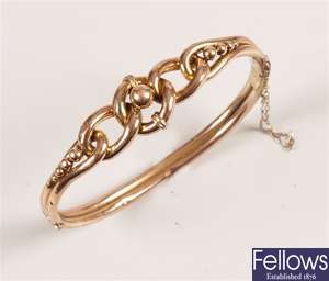 9ct gold bangle with intertwined central gold