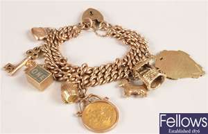 9ct gold double curb link bracelet with nine