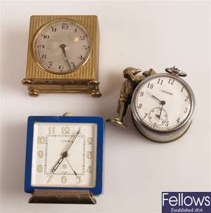 Three assorted travel clocks to include Longines,