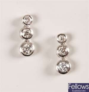 Pair of 18ct white gold diamond dropper earrings