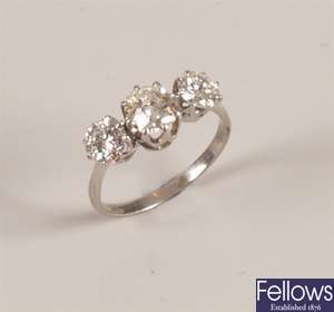 Platinum three stone ring, with a central old