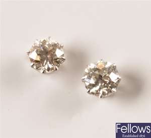Pair of round brilliant diamond set stud earrings