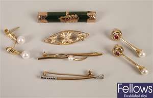 Four 9ct gold brooches to include an open work