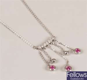 18ct white gold pink sapphire necklet, a central