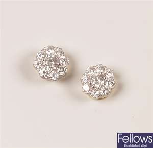 Pair of 18ct gold nine stone diamond cluster stud