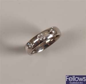 18ct white gold three stone band ring with collet