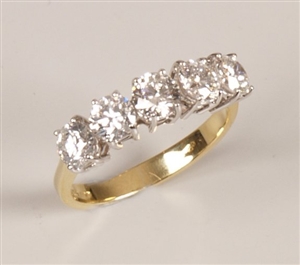 18ct gold five stone diamond ring set round