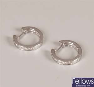Pair of 18ct white gold diamond hoop earrings