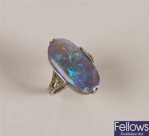 9ct white gold single stone black opal ring set