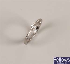 Platinum diamond ring with a central tension set