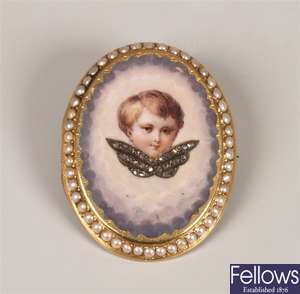 Victorian oval brooch with central enamelled