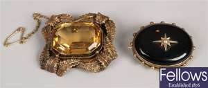 Two mourning brooches, to include an oval onyx