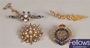 Four brooches to include a 15ct seed pearl brooch