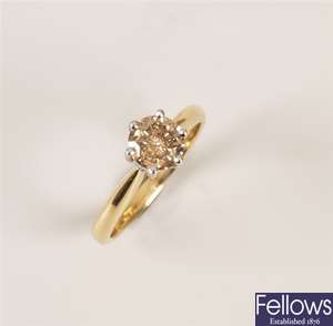 18ct gold single stone diamond ring set a cognac
