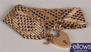 9ct gold gate bracelet, in a wide design with