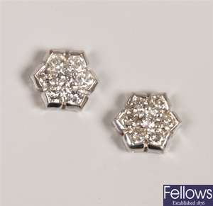A pair of 18ct gold round brilliant diamond set