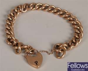 9ct rose gold curb link bracelet with padlock,
