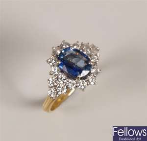 18ct gold sapphire and diamond cluster ring, a