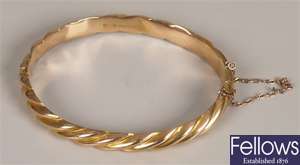 Victorian 9ct gold hinged bangle in a twisted