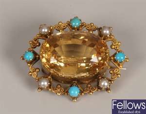 Ornate citrine set brooch, with wirework outer
