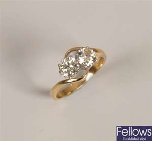 18ct gold two stone diamond ring in a crossover