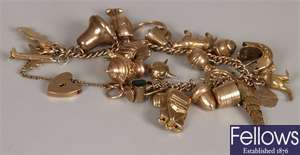 9ct gold curb link charm bracelet, with various