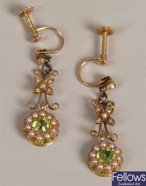 A pair of 15ct gold seed pearl and peridot set