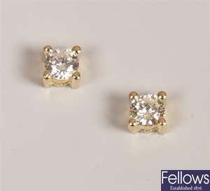 Pair of 18ct yellow gold claw set diamond stud