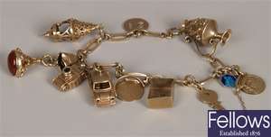 9ct gold charm bracelet in a fetter and link