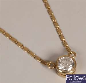14k gold collet set single stone diamond pendant