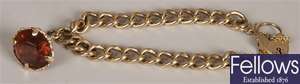 9ct gold curb link bracelet with padlock and