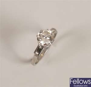 Platinum single stone diamond ring with a central