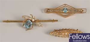 Three brooches, to include a seed pearl and coral