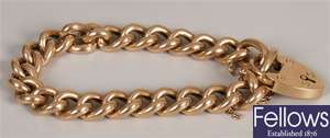15ct gold hollow curb bracelet and padlock