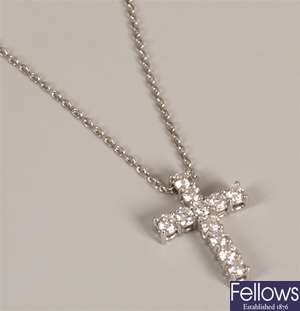 18ct white gold cross set with eleven round cut
