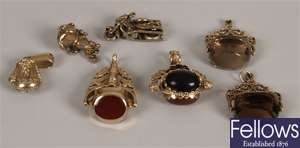Four 9ct gold stone set swivel fob pendants of