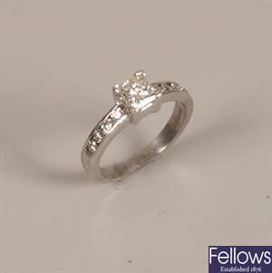 18ct white gold diamond set ring, with a central