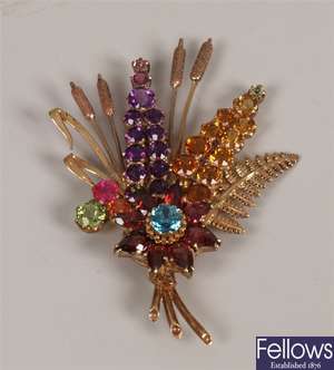 9ct gold multi gem set brooch in the design of a
