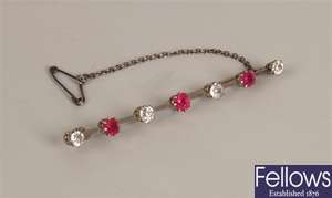 Ruby and diamond set bar brooch, with four old