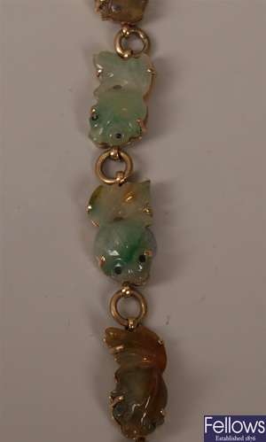 9ct gold carved jade fish design bracelet. Length