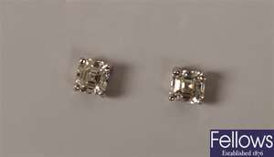 A pair of 18ct white gold square step cut diamond