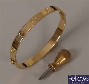 18ct gold Cartier style bangle with screw